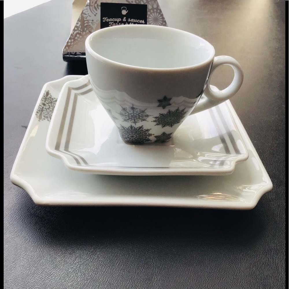 Porcelain teacup and saucer with side plate